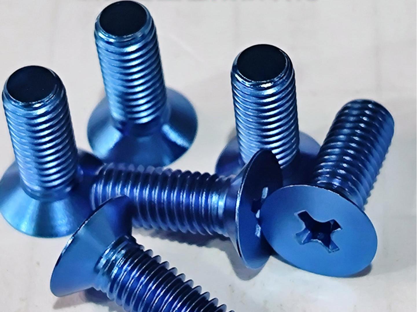 Aerospace titanium alloy parts with blue anodized finish for enhanced corrosion resistance and aesthetic appeal.