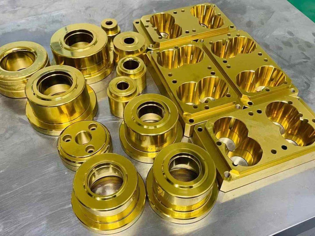 A technician anodizing a metal component for enhanced durability and aesthetics.