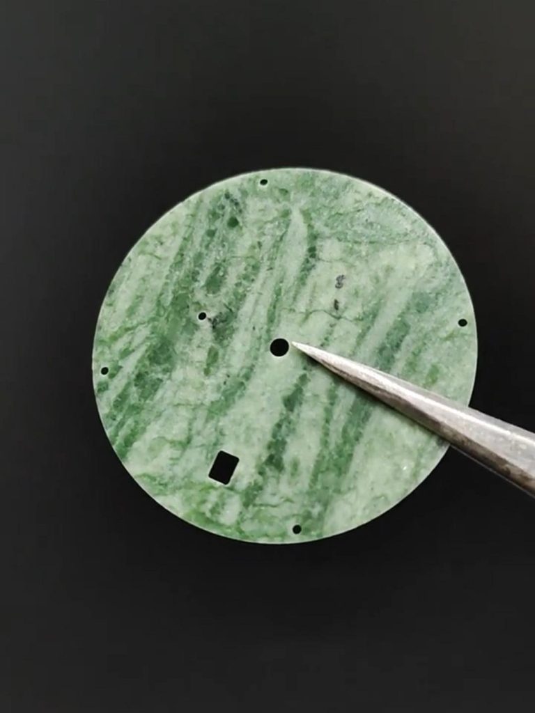 Apple-green Chrysoprase gemstone with smooth polish.