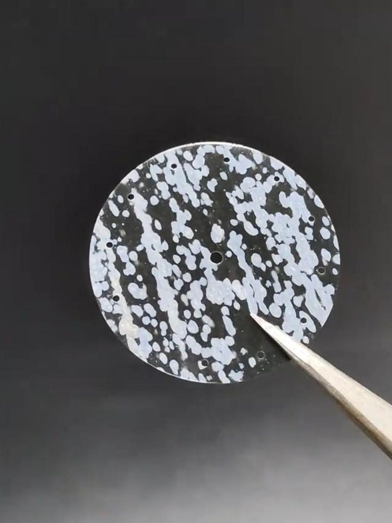 Black Snowflake Obsidian with white snowflake-like crystals.
